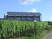 D'Haus vum Energiepark mat de Sonnekollektoren an de Solarzellen